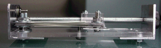 Side view of capacitor showing plates Side view of capacitor showing plates